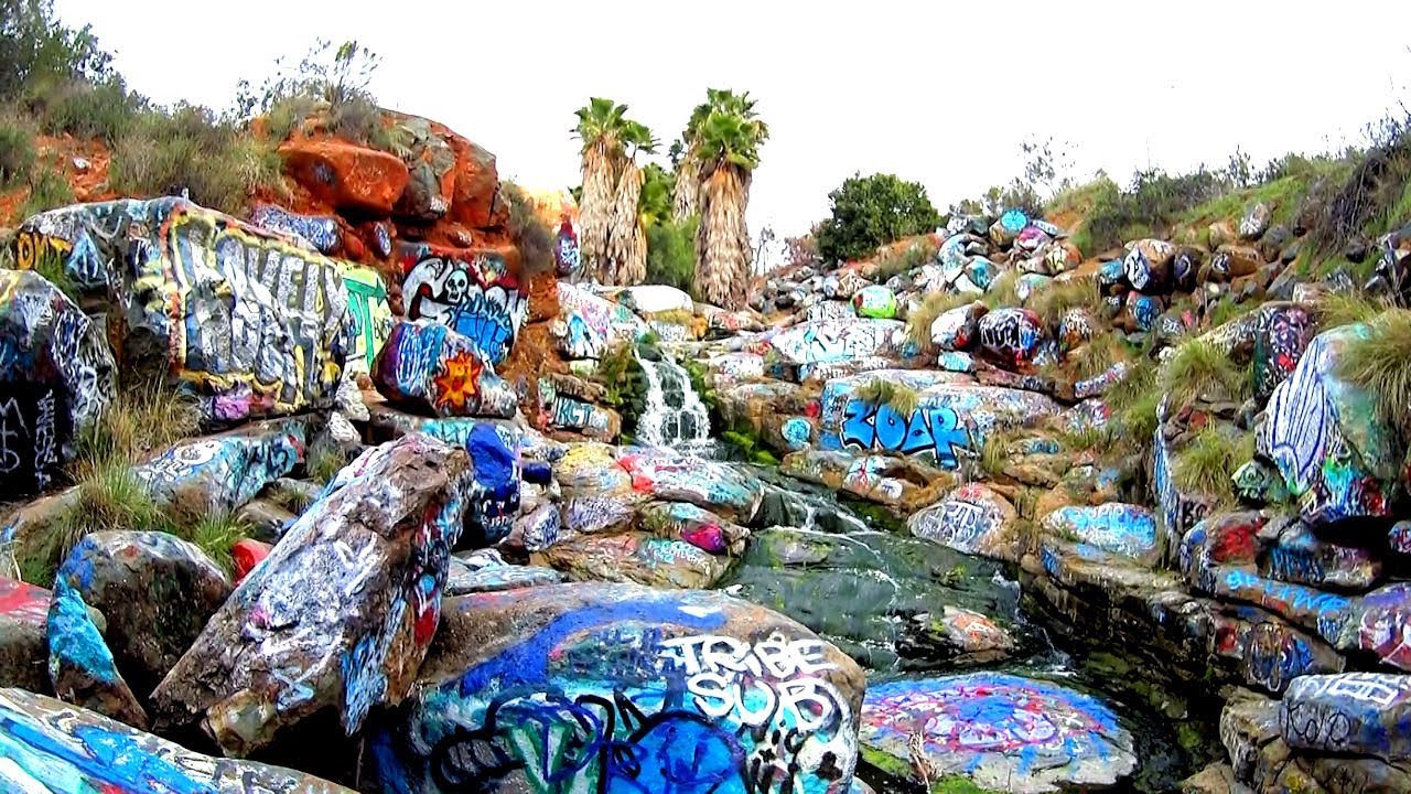 Diversity graffiti ruined waterfall